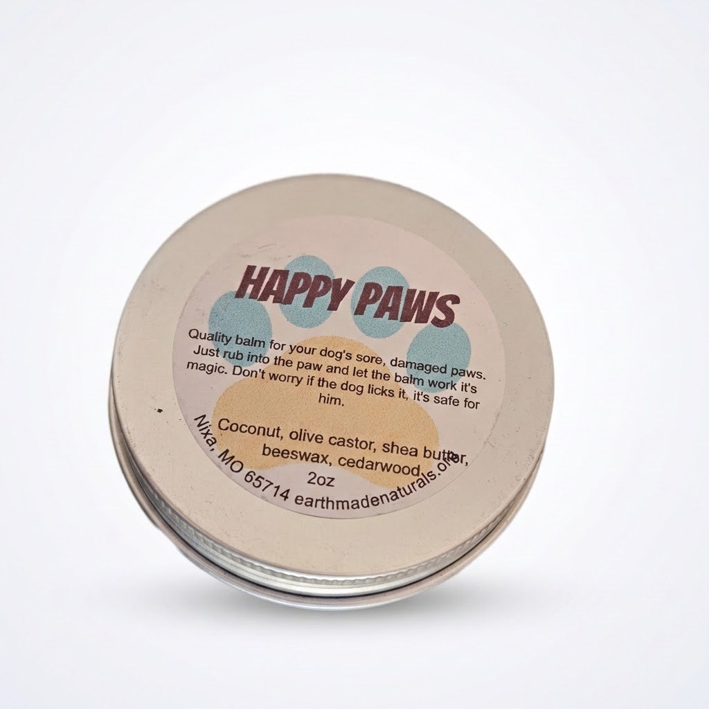 A round metal tin of Earth Made Naturals Happy Paws dog balm, featuring a beige lid with a colorful label and visible silver metal rim, set against a plain white background.