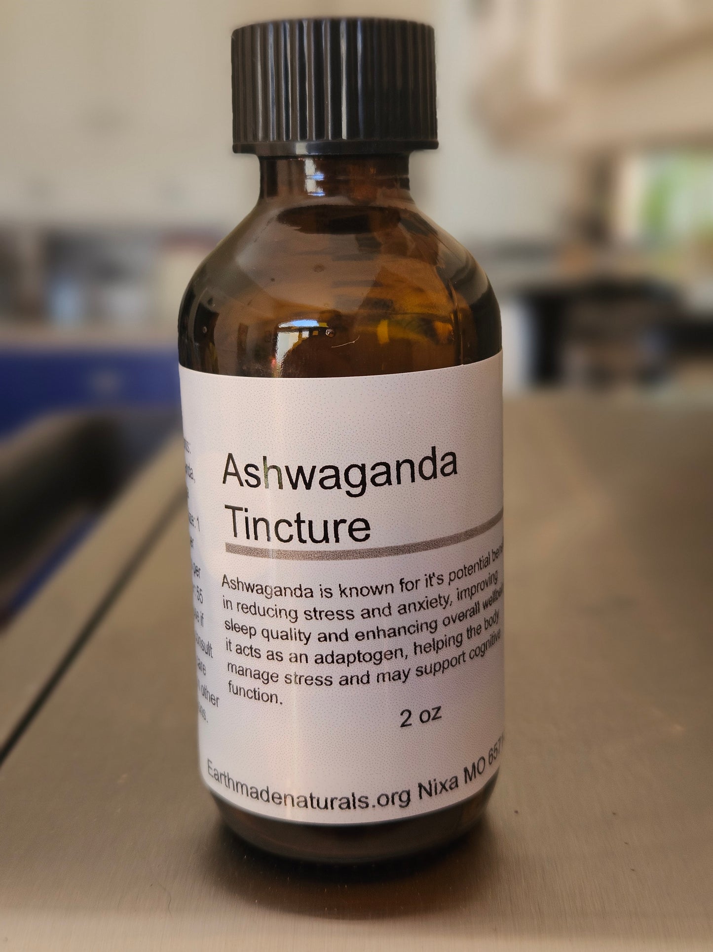 Bottle of Ashwaganda Tincture with a label on a blurred background
