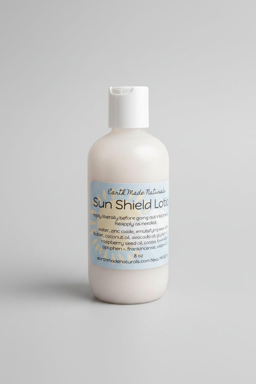 Sun shield lotion bottle with label on a textured beige background
