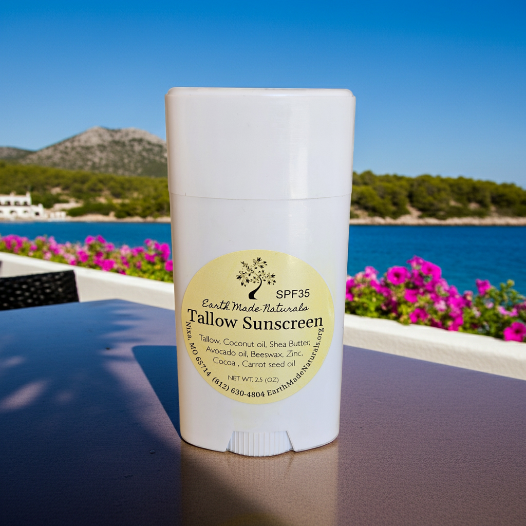 Tallow Sunscreen stick with a scenic background of water and mountains